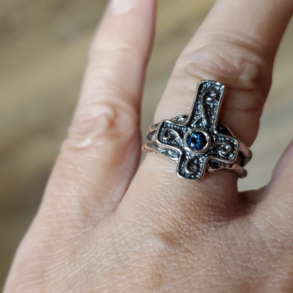 Brand new cross ring sterling silver with blue topaz stone in size 6